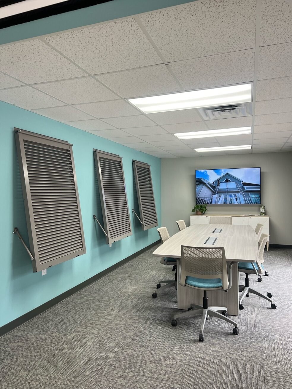 In-house fabric shop with rolls of awning material on shelves