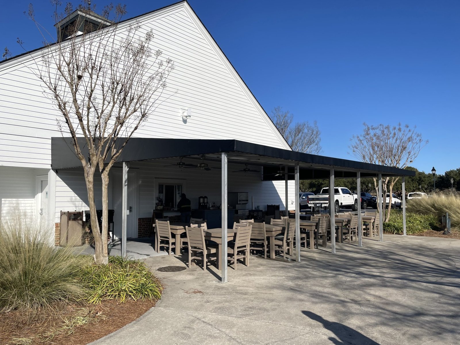 Marquee-style fabric awning over a commercial entrance