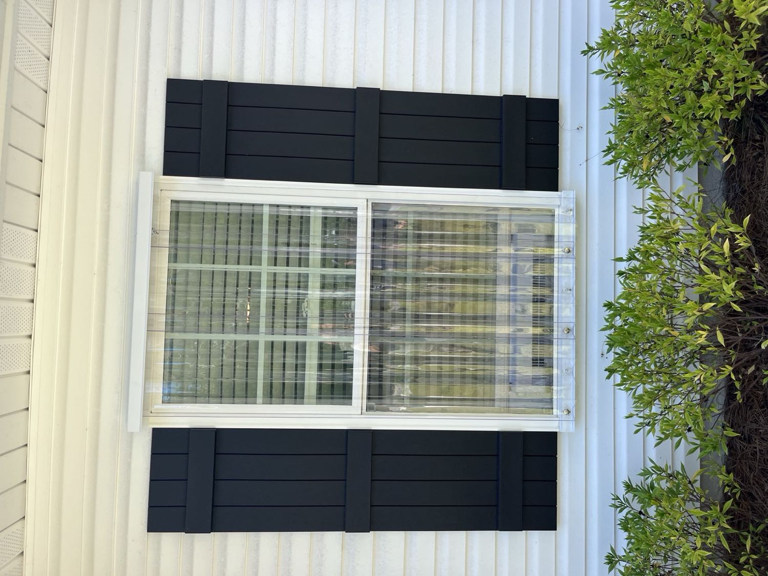 Storm panels installed over windows before a storm