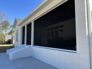 Modern house with large screened windows